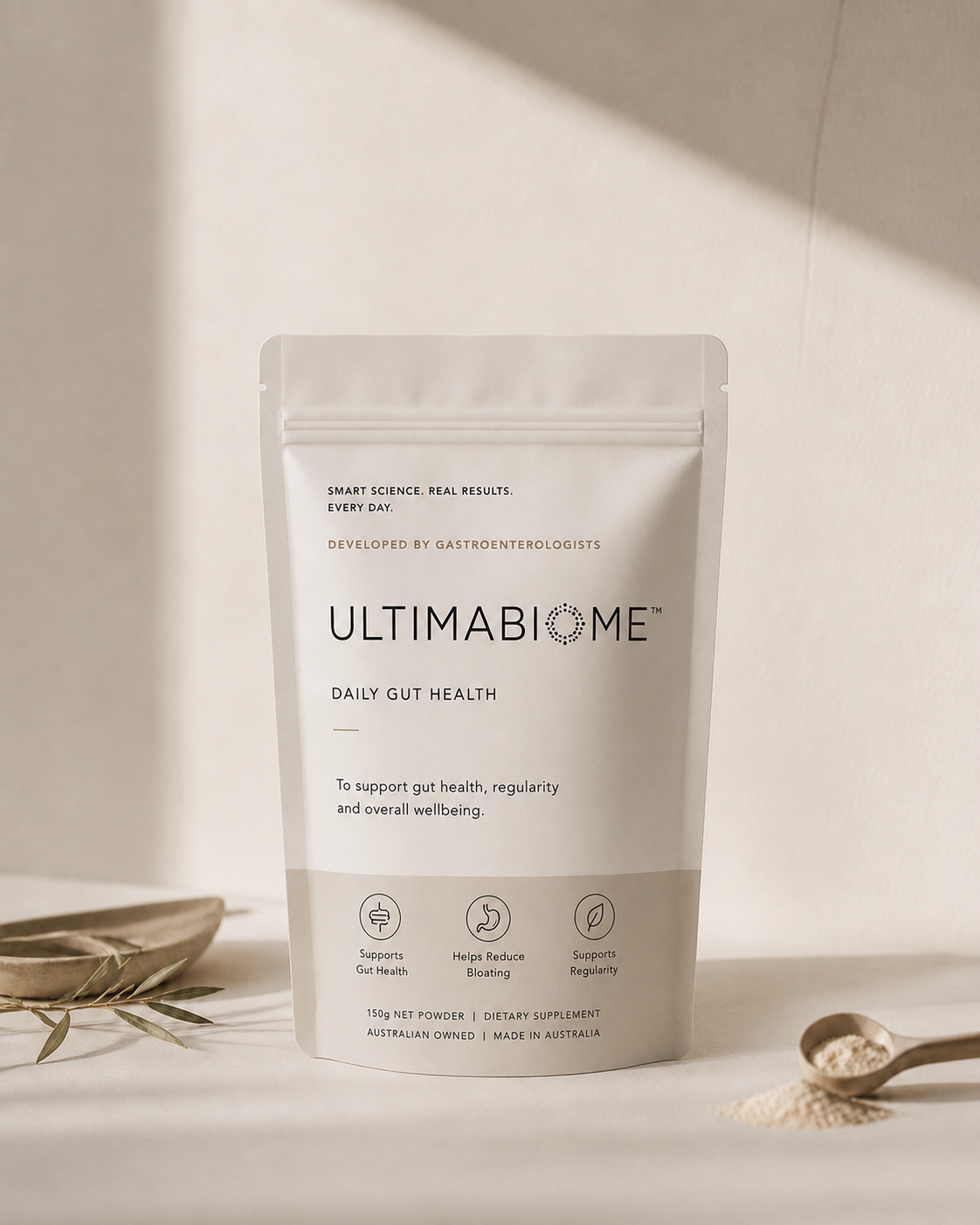 ULTIMABIOME daily gut health pouch on warm ivory backdrop